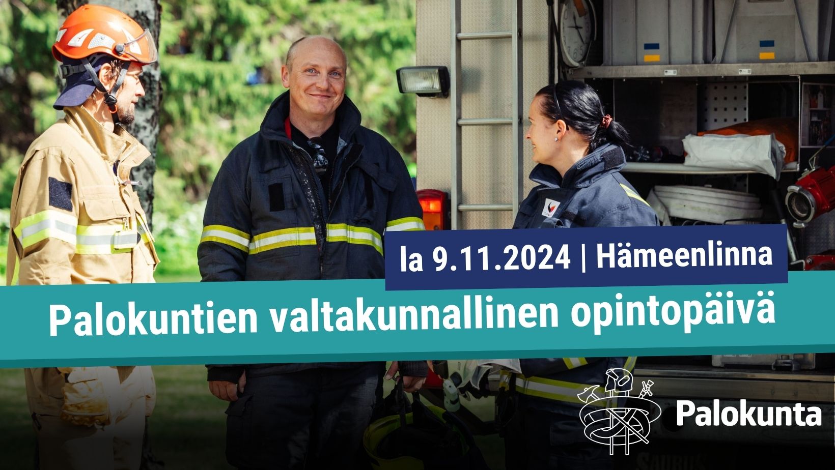 Kuvassa palokuntalaisia sammutusasut päällä paloauton edessä.